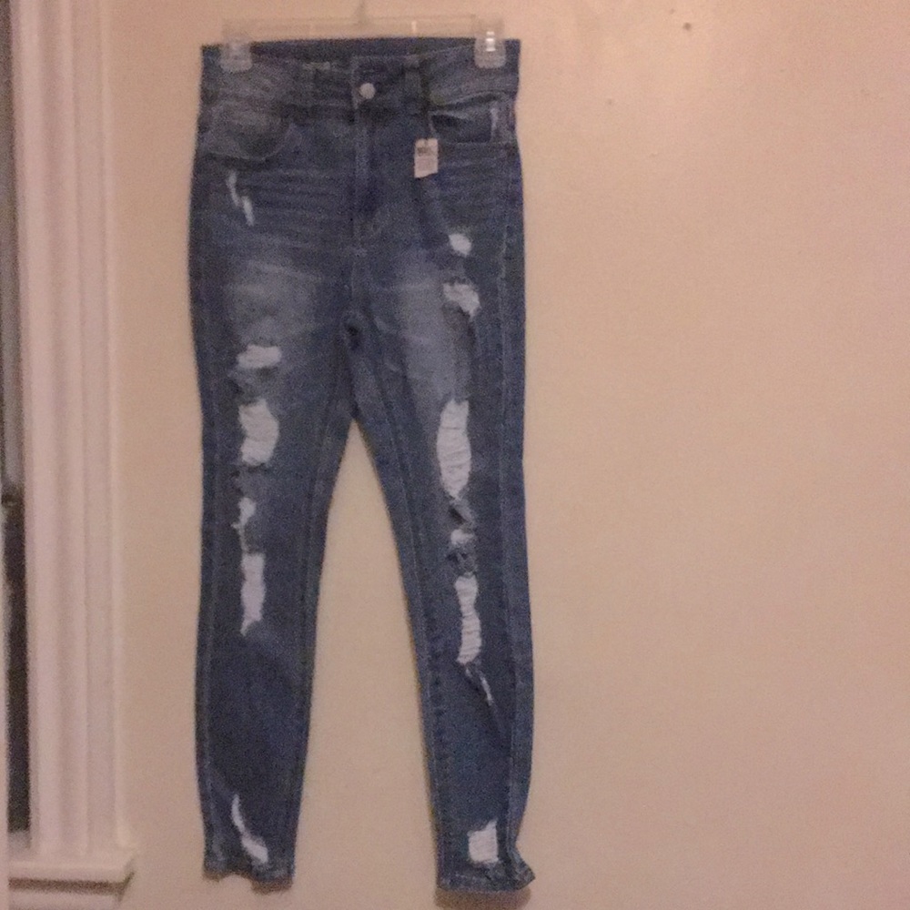 Distressed high rise skinny stretchy jeans